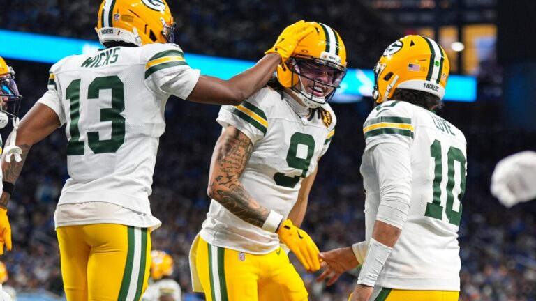 Love matches career high with 4 TD passes, lifting Packers to 31-24 win over Lions