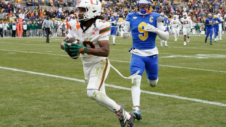 No. 13 Miami beats No. 24 Pitt 38-7 to state case for CFP