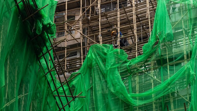 Defenders of bamboo scaffolding say other factors caused the deadly Hong Kong apartment fire