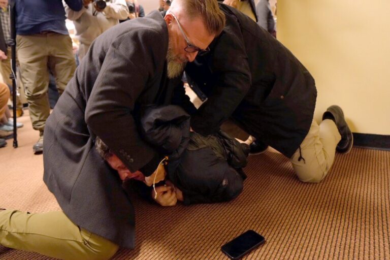 Man tackled to ground after spraying unknown substance on Rep. Ilhan Omar at Minneapolis town hall