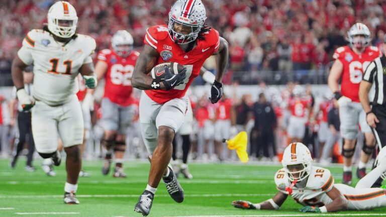 Defending champ Ohio State is out with loss to Miami