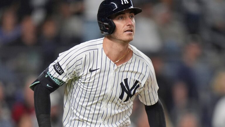 Cody Bellinger stays with Yankees, AP source says