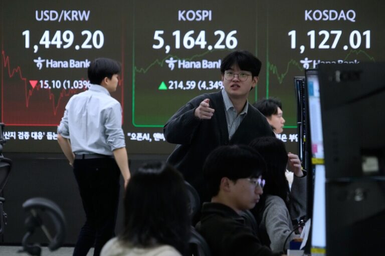 Asian shares surge as markets regain calm
